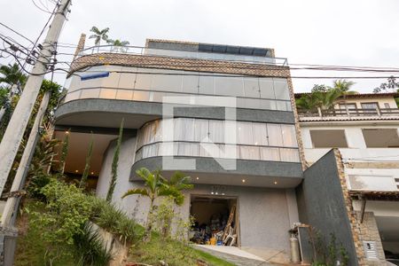 Casa de condomínio à venda com 600m², 5 quartos e 4 vagasFachada