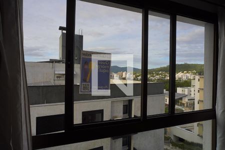 Sala - Vista de apartamento para alugar com 1 quarto, 48m² em Carvoeira, Florianópolis