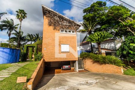 Casa de condomínio à venda com 550m², 4 quartos e 4 vagas Casa de condomínio à venda com 550m², 4 quartos e 4 vagasGaragem