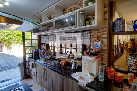 Casa à venda com 420m², 4 quartos e 4 vagascozinha e bar