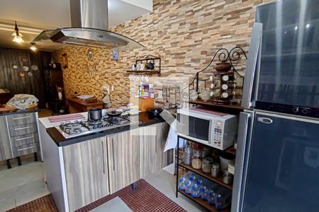 Casa à venda com 420m², 4 quartos e 4 vagascozinha e bar