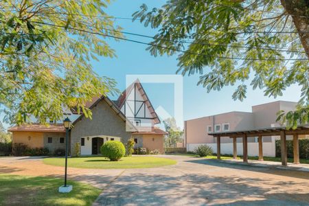 Casa de condomínio para alugar com 580m², 6 quartos e 4 vagasFachada frente