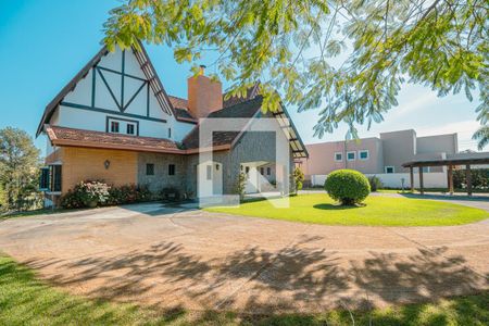 Casa de condomínio para alugar com 580m², 6 quartos e 4 vagasFachada frente