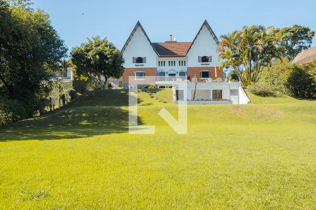 Casa de condomínio para alugar com 580m², 6 quartos e 4 vagasFachada