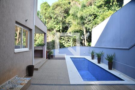 Casa de condomínio para alugar com 370m², 4 quartos e 6 vagasQuintal