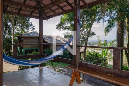 Casa de condomínio para alugar com 200m², 2 quartos e 2 vagas Casa de condomínio para alugar com 200m², 2 quartos e 2 vagasSala - Varanda