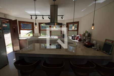 Casa de condomínio para alugar com 348m², 4 quartos e 2 vagasCozinha