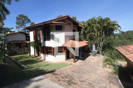 Casa de condomínio para alugar com 348m², 4 quartos e 2 vagasFachada