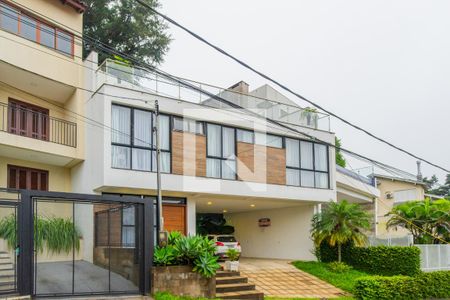 Casa de condomínio à venda com 287m², 3 quartos e 4 vagas Casa de condomínio à venda com 287m², 3 quartos e 4 vagasFachada