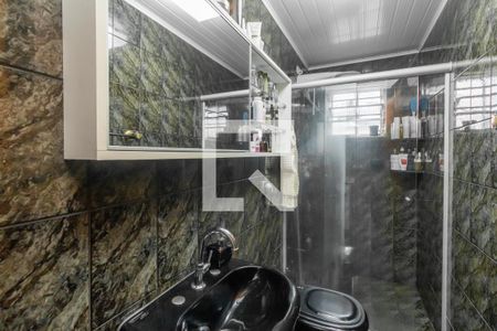 Casa à venda com 210m², 3 quartos e 3 vagasBanheiro Quarto 1