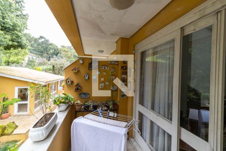 Varanda de casa de condomínio à venda com 3 quartos, 159m² em Cristal, Porto Alegre