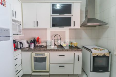 Casa de condomínio à venda com 125m², 3 quartos e 2 vagasCozinha e Área de Serviço