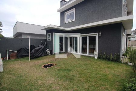Casa de condomínio à venda com 180m², 3 quartos e 2 vagasQuintal