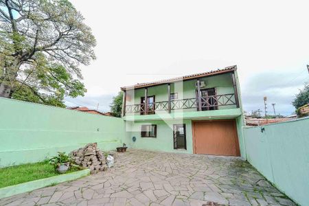 Fachada de casa para alugar com 4 quartos, 234m² em Vila Jardim, Porto Alegre