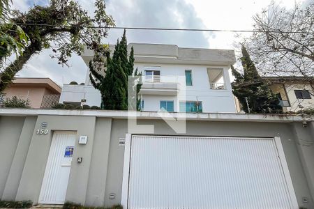 Casa à venda com 380m², 5 quartos e 6 vagasFachada + plaquinha