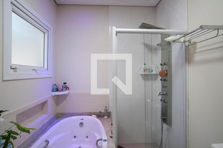 Casa à venda com 396m², 4 quartos e 4 vagasBanheiro suíte 1