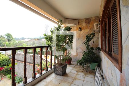 Casa de condomínio à venda com 377m², 6 quartos e 2 vagasQuarto 3 - Varanda da Suíte