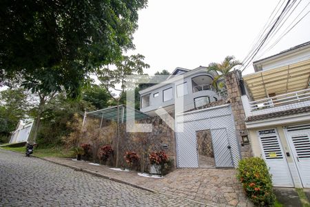 Casa de condomínio para alugar com 600m², 3 quartos e 2 vagasFachada