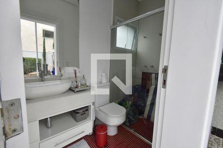 Casa de condomínio à venda com 311m², 4 quartos e 4 vagasBanheiro de serviço