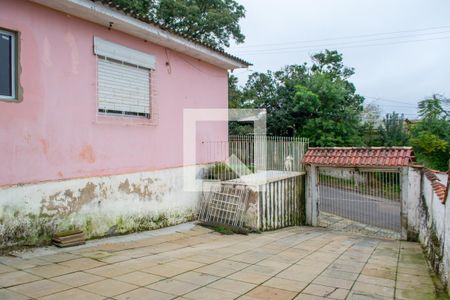 Entrada garagem de casa à venda com 2 quartos, 407m² em Ipanema, Porto Alegre