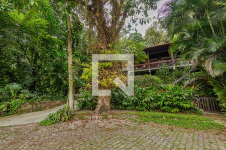 Casa de condomínio à venda com 550m², 4 quartos e 2 vagasFachada