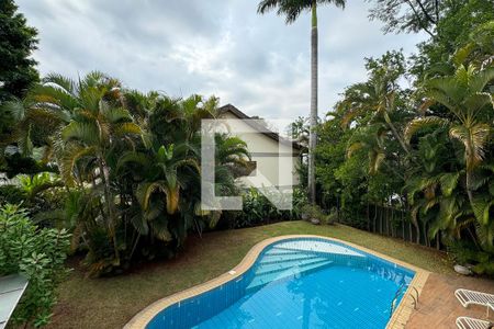 Casa de condomínio para alugar com 450m², 4 quartos e 6 vagasvista da Suíte 1