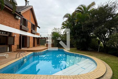 Casa de condomínio para alugar com 450m², 4 quartos e 6 vagasPiscina