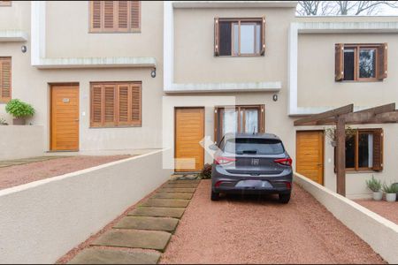 Casa de condomínio à venda com 123m², 2 quartos e 2 vagasEstacionamento / Fachada Casa