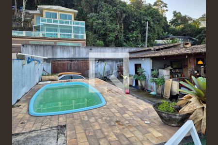 Casa de condomínio à venda com 570m², 5 quartos e 3 vagasÁrea externa
