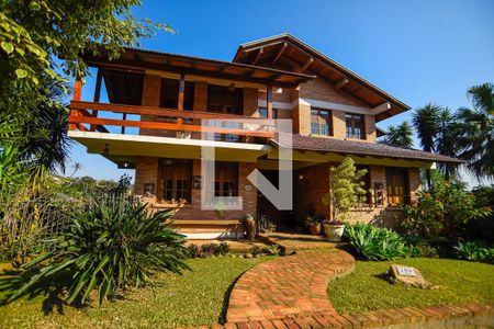 Casa de condomínio para alugar com 700m², 2 quartos e 5 vagas Casa de condomínio para alugar com 700m², 2 quartos e 5 vagasFachada