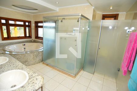 Casa de condomínio para alugar com 700m², 2 quartos e 5 vagas Casa de condomínio para alugar com 700m², 2 quartos e 5 vagasBanheiro da Suíte 4