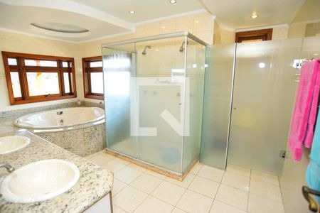 Casa de condomínio para alugar com 700m², 2 quartos e 5 vagas Casa de condomínio para alugar com 700m², 2 quartos e 5 vagasBanheiro da Suíte 4