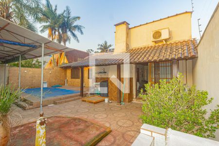 Casa à venda com 350m², 5 quartos e 5 vagasFachada posterior