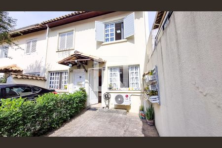 Casa de condomínio para alugar com 124m², 3 quartos e 2 vagas Casa de condomínio para alugar com 124m², 3 quartos e 2 vagasFachada_garagem