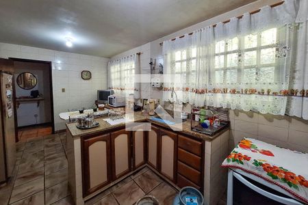 Casa de condomínio à venda com 250m², 4 quartos e 4 vagas Casa de condomínio à venda com 250m², 4 quartos e 4 vagasCozinha