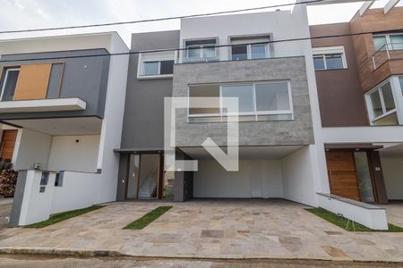 Casa de condomínio à venda com 256m², 4 quartos e 2 vagasFachada