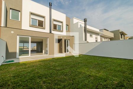 Casa de condomínio à venda com 256m², 4 quartos e 2 vagasQuintal