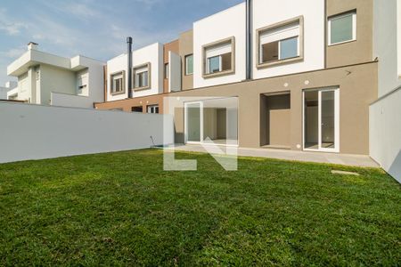 Casa de condomínio à venda com 256m², 4 quartos e 2 vagasQuintal