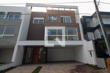 Casa de condomínio à venda com 256m², 4 quartos e 2 vagasFachada