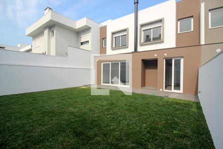 Casa de condomínio à venda com 256m², 4 quartos e 2 vagasQuintal