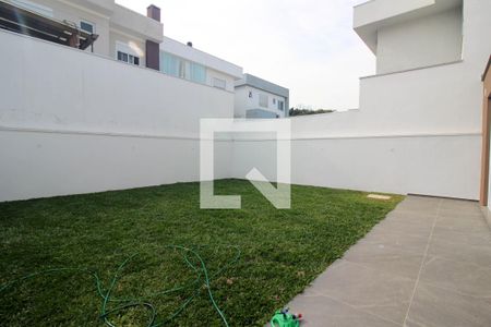 Casa de condomínio à venda com 256m², 4 quartos e 2 vagasQuintal