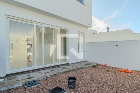 Casa de condomínio à venda com 162m², 3 quartos e 2 vagasQuintal