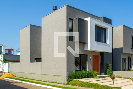 Casa de condomínio à venda com 157m², 3 quartos e 2 vagas Casa de condomínio à venda com 157m², 3 quartos e 2 vagasFachada