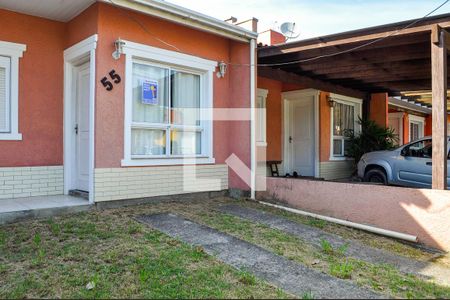 Casa de condomínio à venda com 52m², 2 quartos e 1 vagaFachada Imóvel - placa