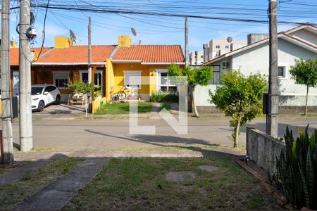 Quarto 1 - vista de casa de condomínio à venda com 2 quartos, 52m² em Hípica, Porto Alegre