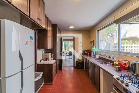 Casa de condomínio à venda com 560m², 4 quartos e 4 vagas Casa de condomínio à venda com 560m², 4 quartos e 4 vagasCozinha