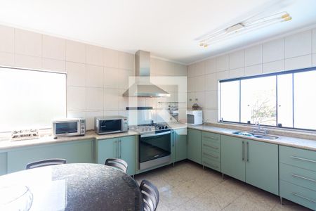 Casa de condomínio à venda com 445m², 4 quartos e 4 vagas Casa de condomínio à venda com 445m², 4 quartos e 4 vagasCozinha