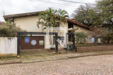 Fachada de casa à venda com 3 quartos, 180m² em Ipanema, Porto Alegre