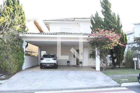Casa de condomínio para alugar com 449m², 4 quartos e 2 vagasFachada