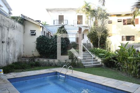 Casa de condomínio para alugar com 449m², 4 quartos e 2 vagasFundos